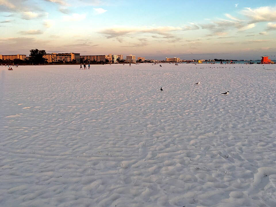 Wide white-sand Siesta Beach near Sarasota at sunset
